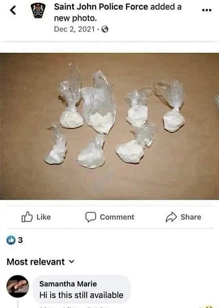Saint John Police Force added a new photo. Dec 2, 2021. The image shows several small plastic bags containing a white powdery substance. A comment reads: 'Hi is this still available'.
