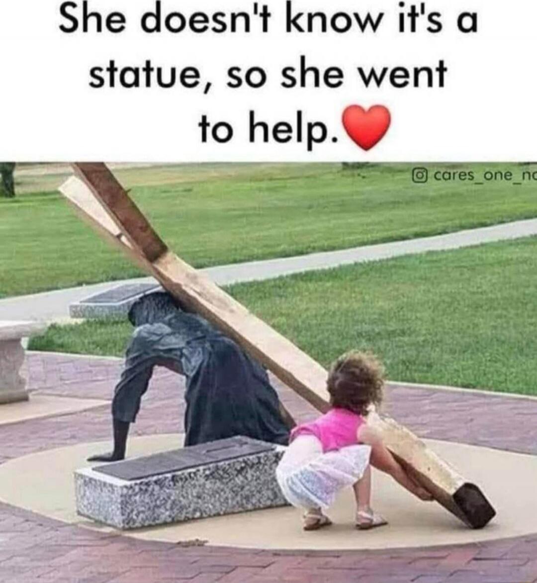 She doesn't know it's a statue, so she went to help.