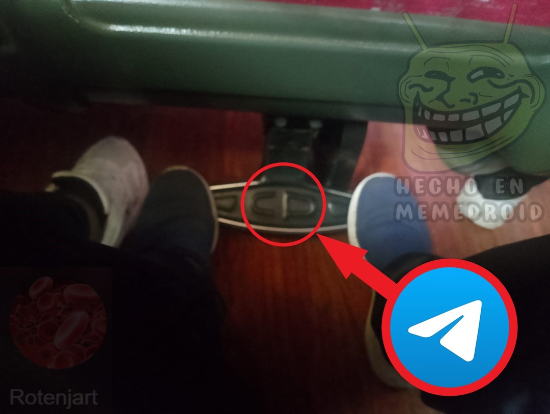 Small metallic object on the floor between two people seated, circled for emphasis.