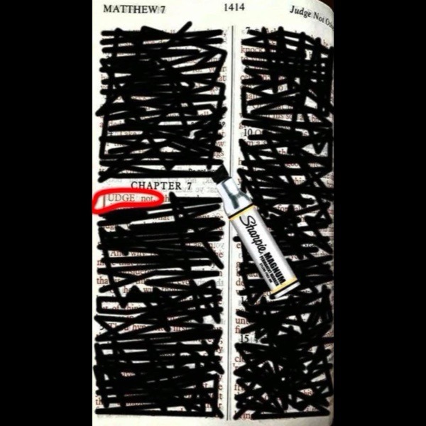 MATTHEW 7, CHAPTER 7, Judge Not (redacted pages on either side; a marker labeled 'Sharpie' rests diagonally across the page)