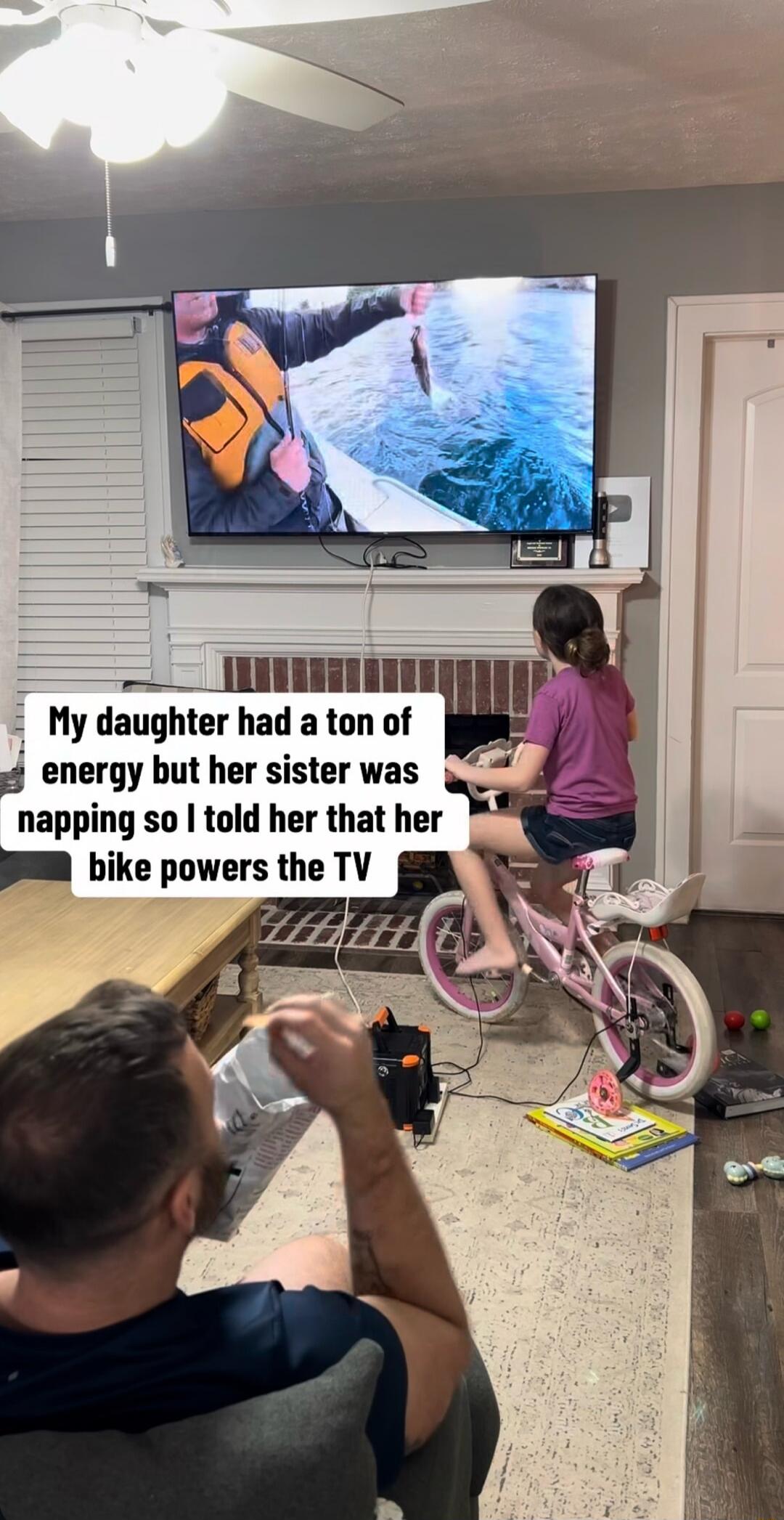My daughter had a ton of energy but her sister was napping so I told her that her bike powers the TV