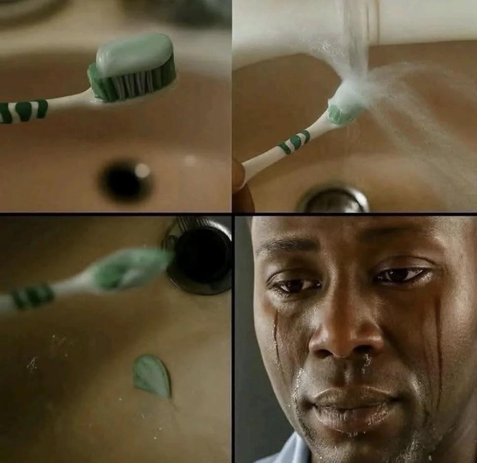 Toothpaste being washed off a toothbrush into a sink, followed by a close-up of a man crying.