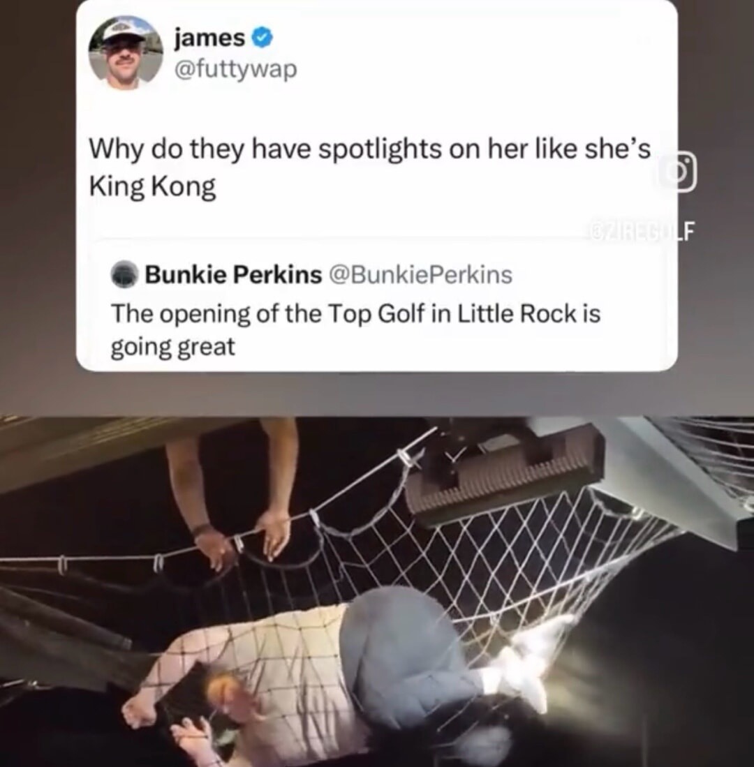 Why do they have spotlights on her like she's King Kong. The opening of the Top Golf in Little Rock is going great.