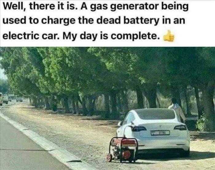 Well, there it is. A gas generator being used to charge the dead battery in an electric car. My day is complete.