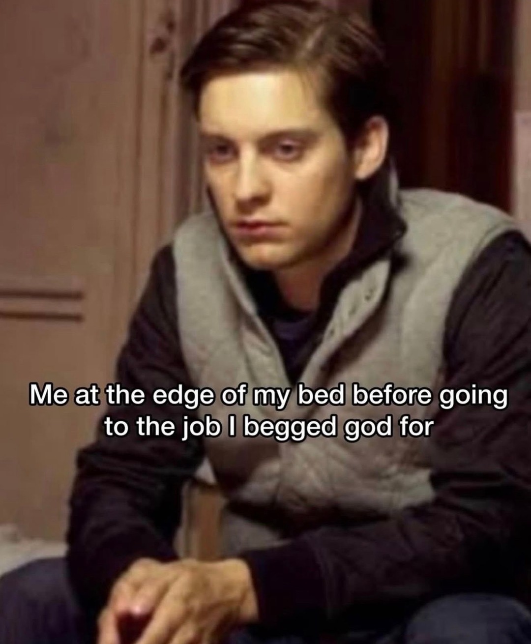 Me at the edge of my bed before going to the job I begged god for