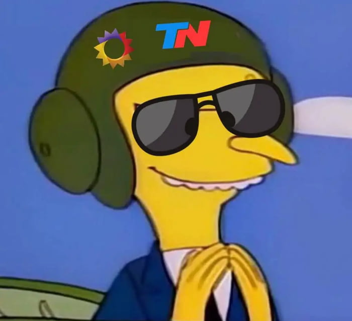 TN. El Sr. Burns con gafas de sol y un casco militar con el logo de TN y un sol.
