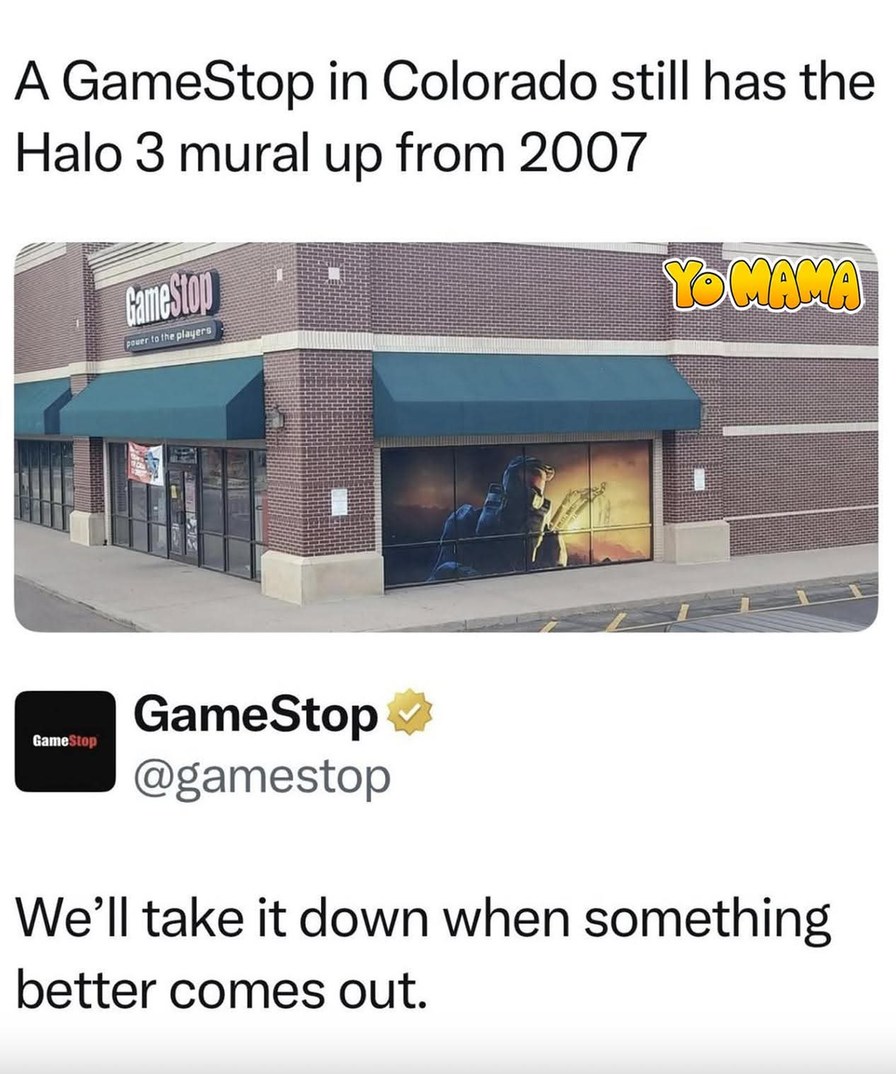 A GameStop in Colorado still has the Halo 3 mural up from 2007. The store sign says 'GameStop power to the players'. There's also a 'YO MAMA' sticker on the building. GameStop's official account replied: 'We'll take it down when something better comes out.'