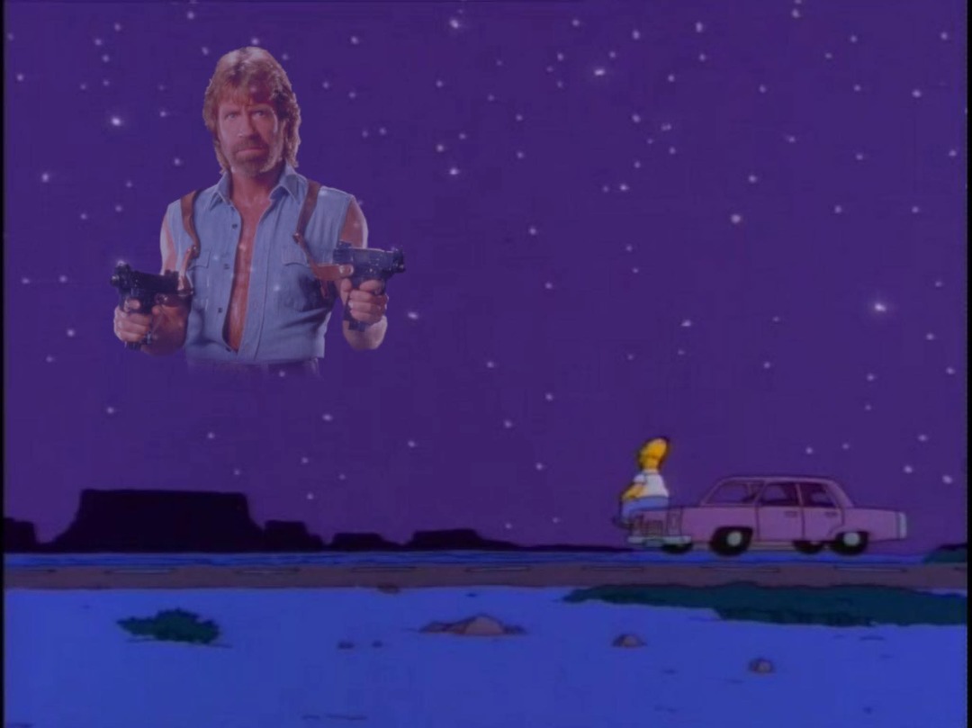 Chuck Norris appears as a giant in the night sky, holding two guns, while Homer Simpson sits on the back of a pink car driving on a road. This is a scene from The Simpsons where Homer is hallucinating.