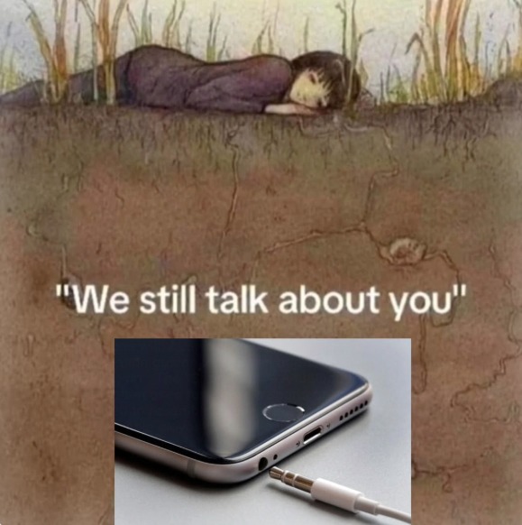 A person is depicted lying underground, with grass and roots above. Below this illustration, there's an image of a smartphone with a headphone jack and a plug. The text 'We still talk about you' is visible.