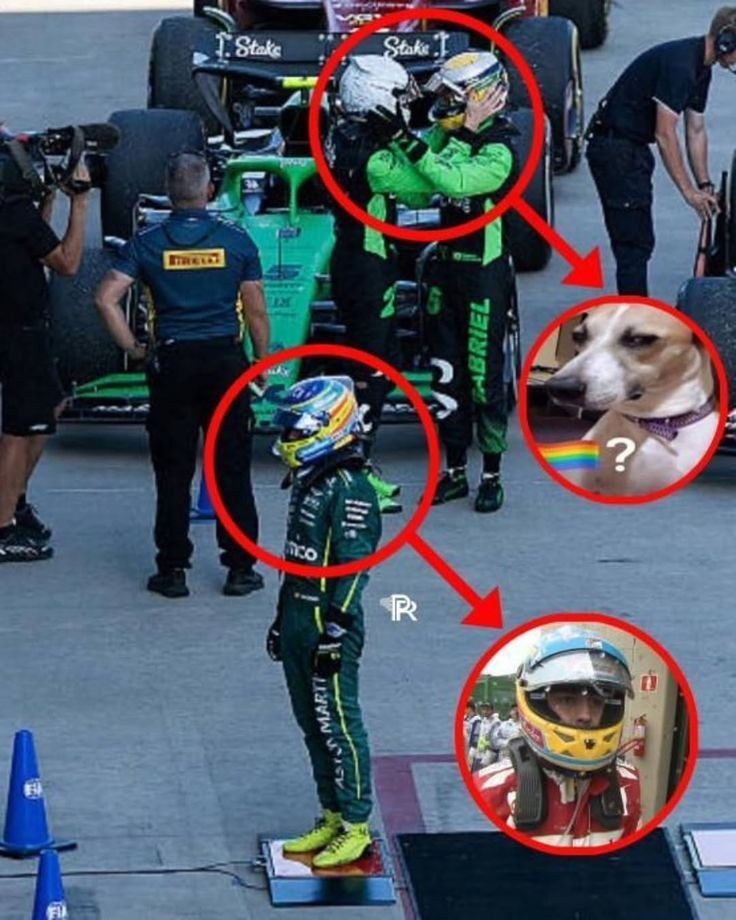 Dos pilotos de Fórmula 1 en el pit lane, uno poniéndose el casco y otro de pie en una báscula. Flechas rojas apuntan a un perro con una expresión confusa y un collar arcoíris con un signo de interrogación, y a un primer plano de la cara de un piloto dentro de su casco con una expresión seria. Se observan las marcas 'T. Stake', 'PIRELLI', 'GABRIEL' 