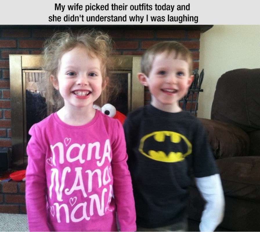 My wife picked their outfits today and she didn't understand why I was laughing. The girl is wearing a pink shirt with 'nana' written on it, and the boy is wearing a black Batman t-shirt over a white long-sleeve shirt.