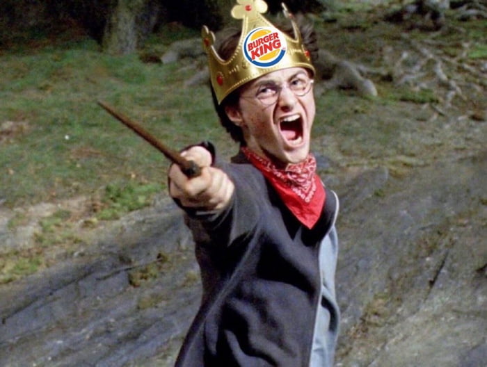 Harry Potter wearing a Burger King crown, holding a wand and screaming. The Burger King logo is visible on the crown.