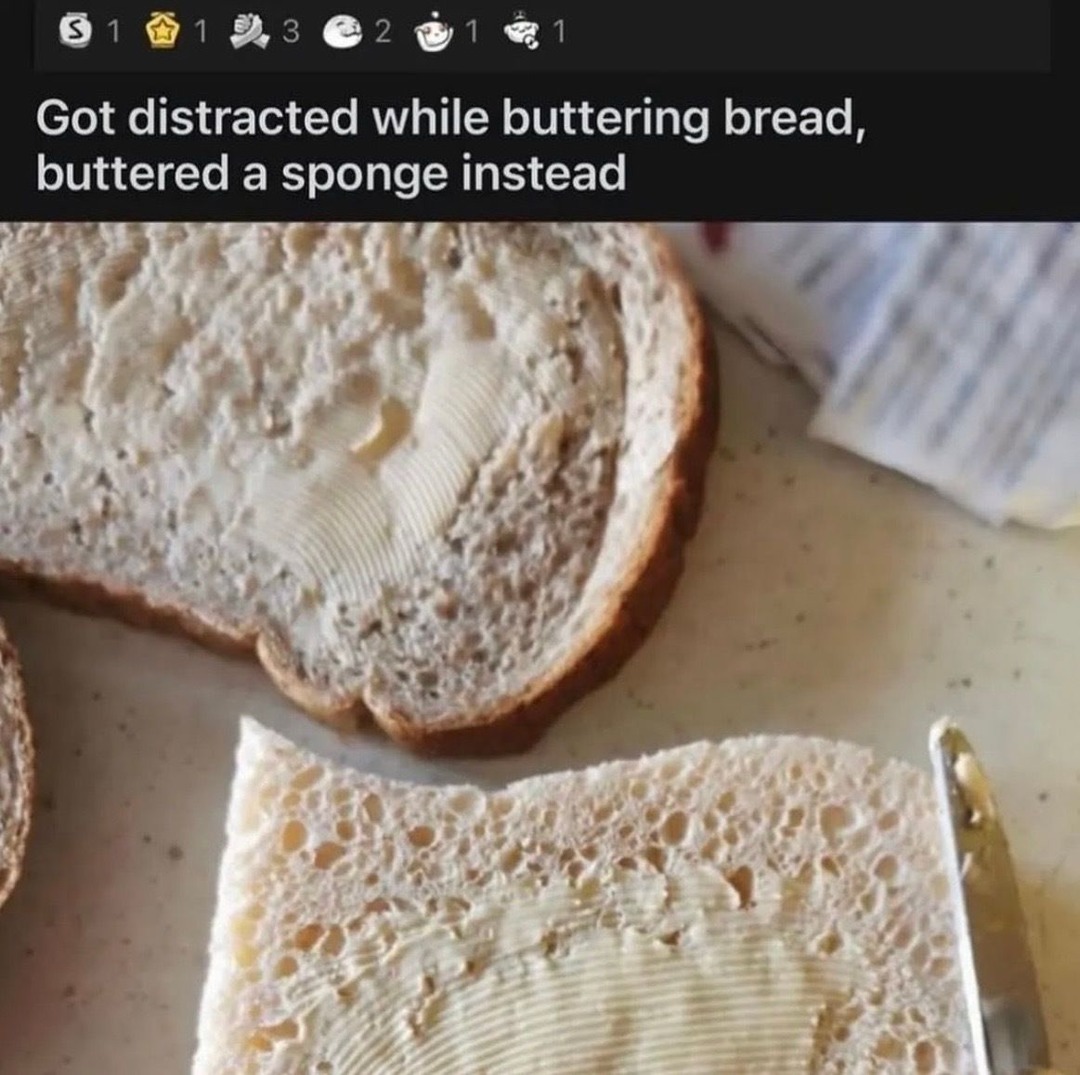 Got distracted while buttering bread, buttered a sponge instead