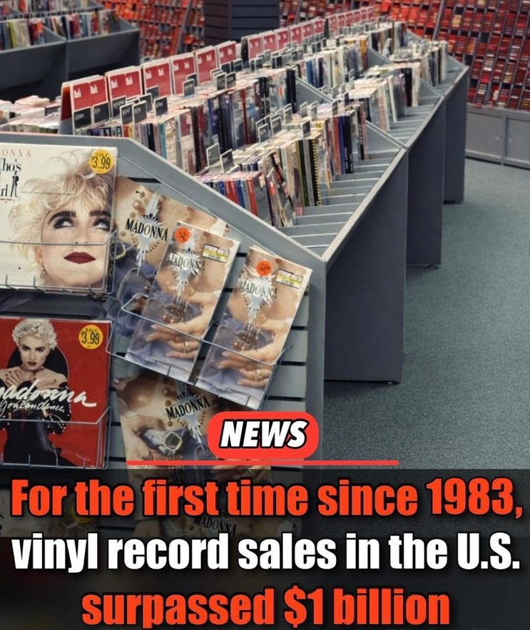 NEWS. For the first time since 1983, vinyl record sales in the U.S. surpassed $1 billion. Madonna album covers are visible, including 'Who's That Girl' and 'You Can Dance', priced at $3.99.