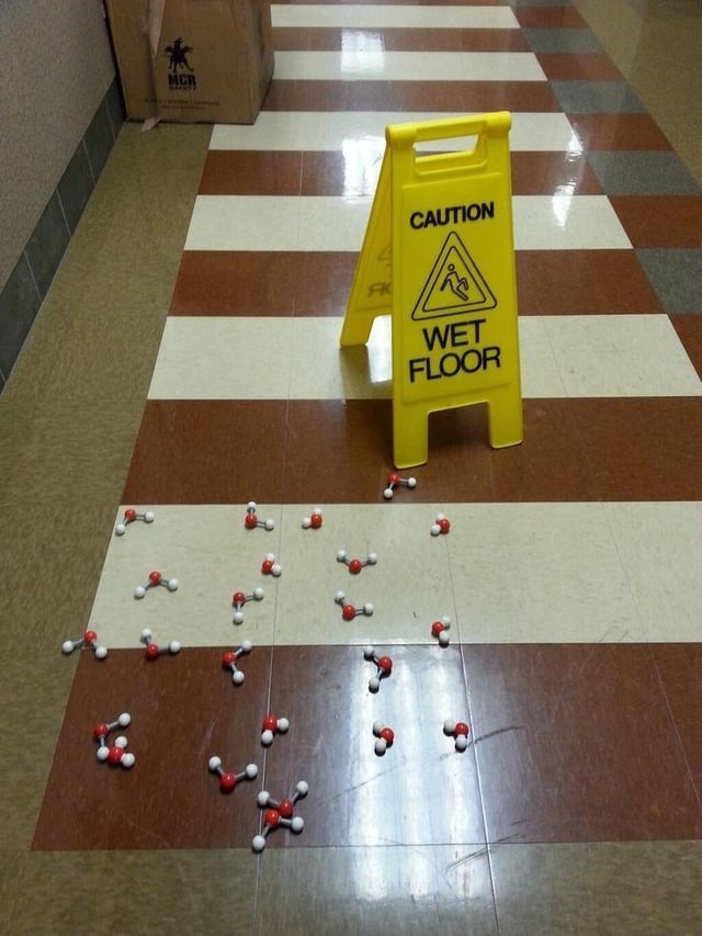CAUTION WET FLOOR