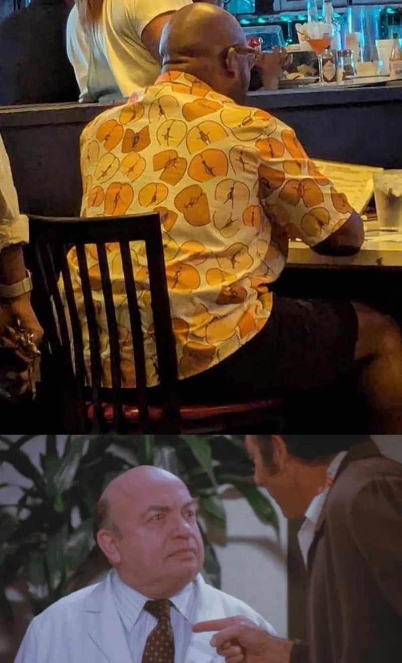 A man wearing a shirt with a pattern resembling buttocks, sitting at a bar, paired with a reaction image of a surprised man.