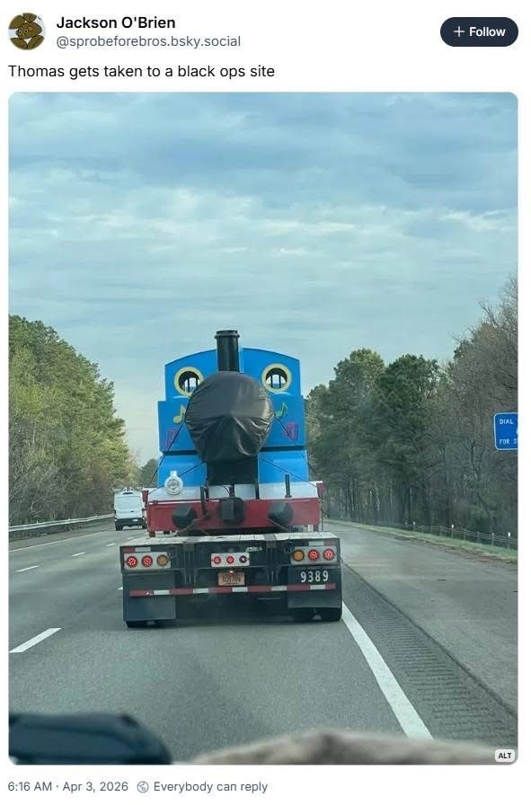 Thomas gets taken to a black ops site. A large replica of Thomas the Tank Engine is being transported on a flatbed truck.