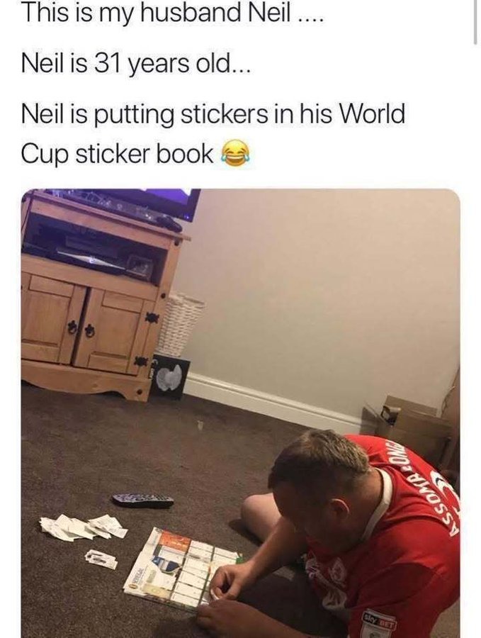 This is my husband Neil .... Neil is 31 years old... Neil is putting stickers in his World Cup sticker book 😂