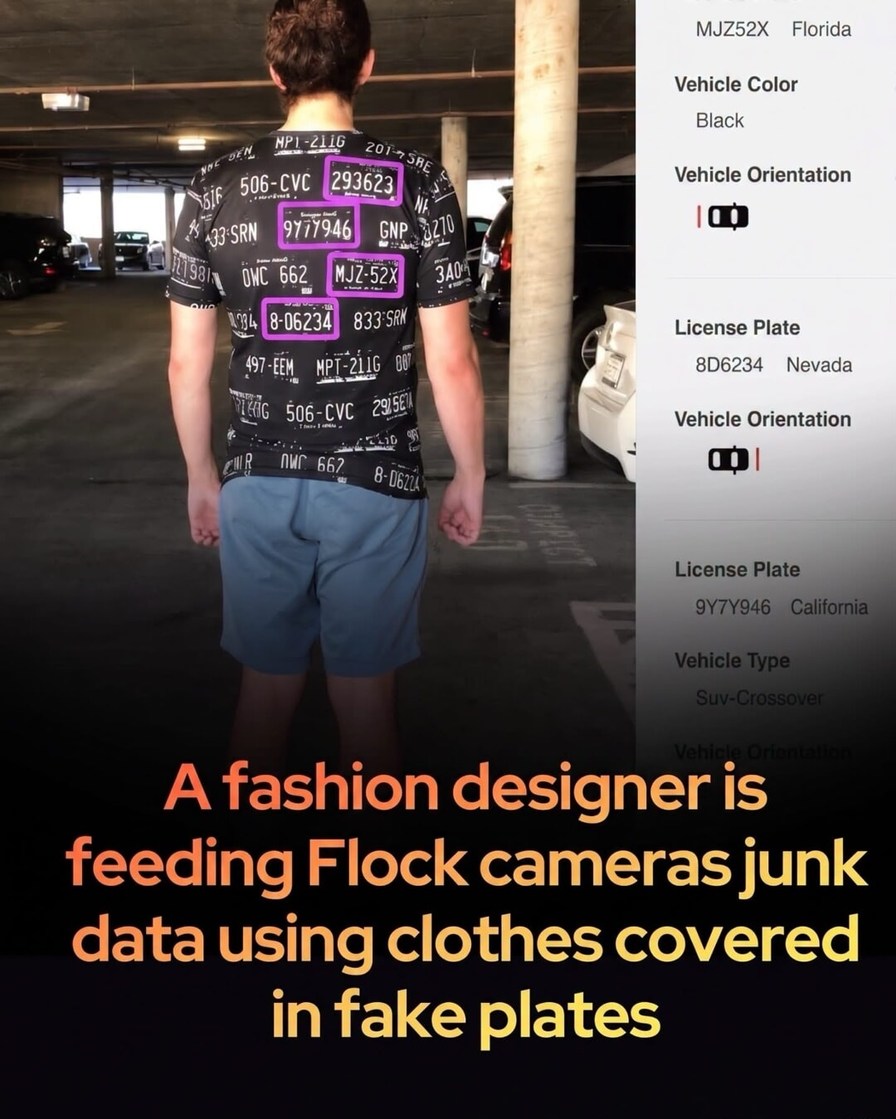 A fashion designer is feeding Flock cameras junk data using clothes covered in fake plates. MJZ-52X Florida, Vehicle Color Black, Vehicle Orientation, License Plate 8D6234 Nevada, Vehicle Orientation, License Plate 9Y7Y946 California, Vehicle Type Suv-Crossover. License plates visible on shirt: 293623, 9Y7Y946, MJZ-52X, 8-06234, 506-CVC, MPT-211G, 